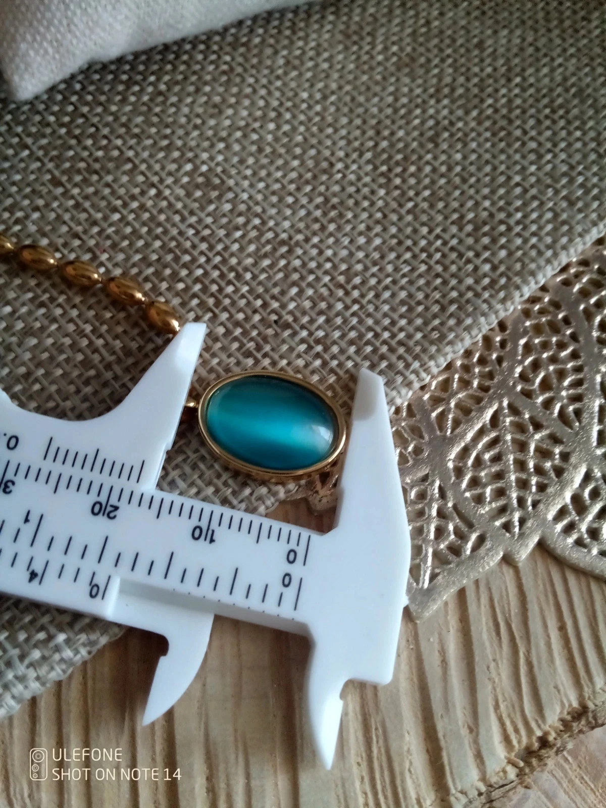 Collier pierre oeil de chat bleu intense – photo 2